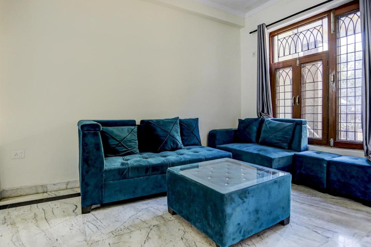 Capital O Uk House Residency Hotel Gurgaon Bagian luar foto