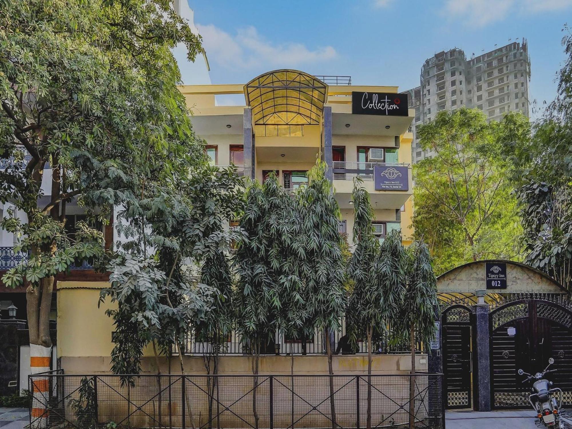 Capital O Uk House Residency Hotel Gurgaon Bagian luar foto