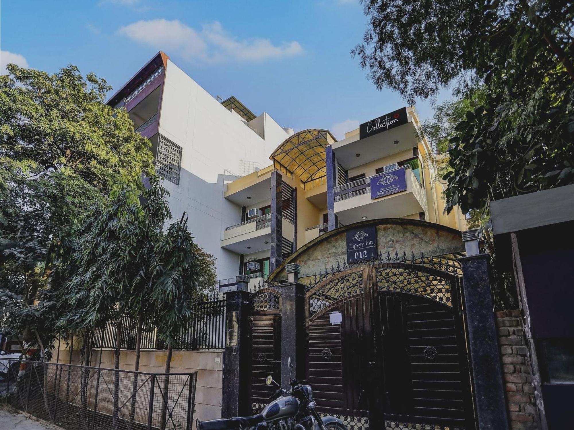 Capital O Uk House Residency Hotel Gurgaon Bagian luar foto