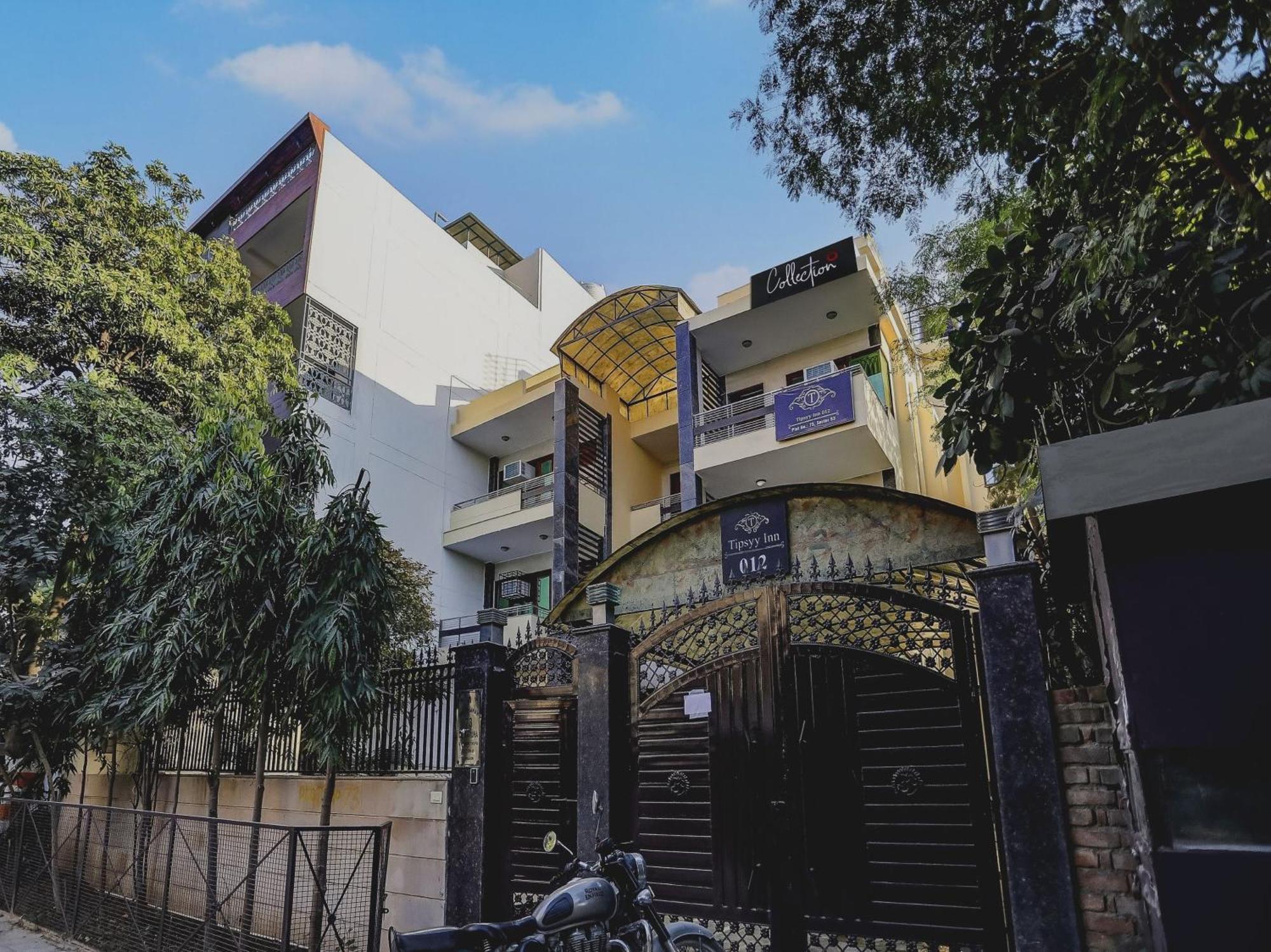 Capital O Uk House Residency Hotel Gurgaon Bagian luar foto