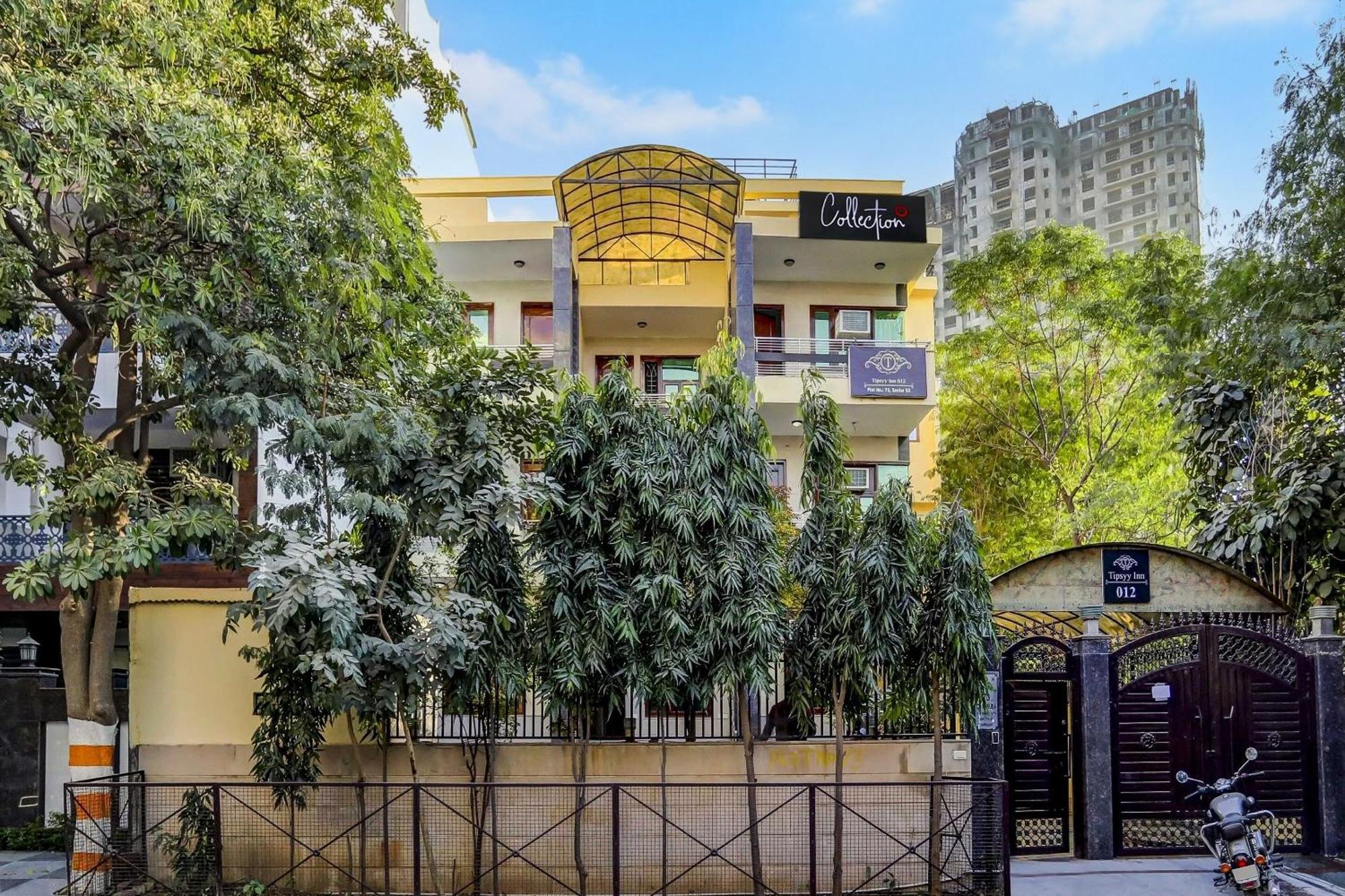 Capital O Uk House Residency Hotel Gurgaon Bagian luar foto